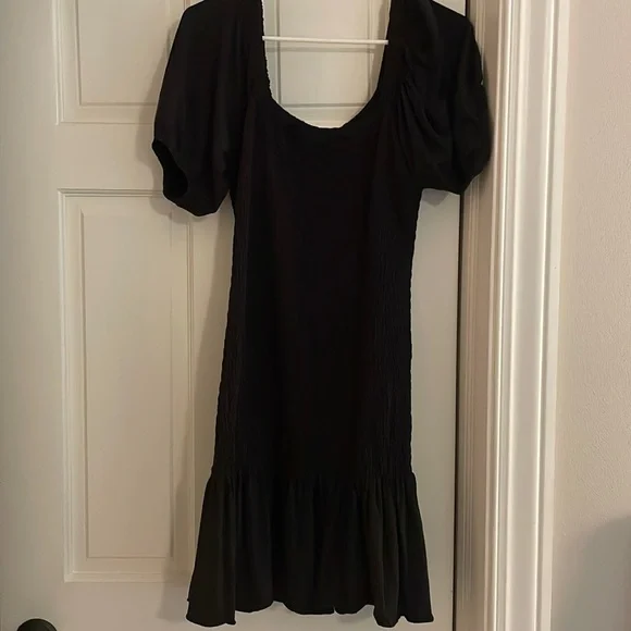 dress that flares out at bottom Monique Off-Shoulder Long Sleeve A-line Lace Gown